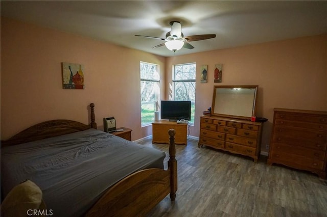 14134 Serpentine Farm Ln, Grass Valley, CA 95949 - bedroom featuring baseboards, ceiling fan, and wood finished floors