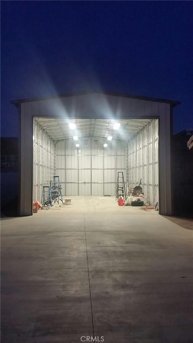 view of garage at night