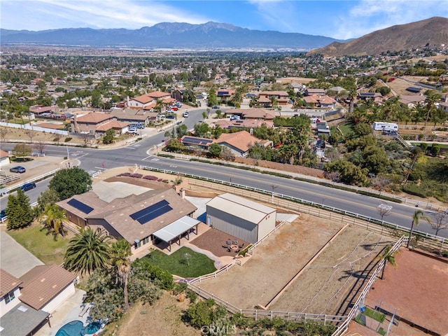 drone / aerial view with a mountain view and a residential view