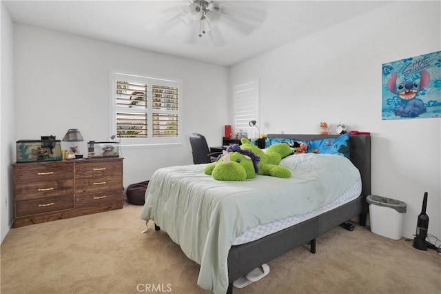 carpeted bedroom featuring a ceiling fan