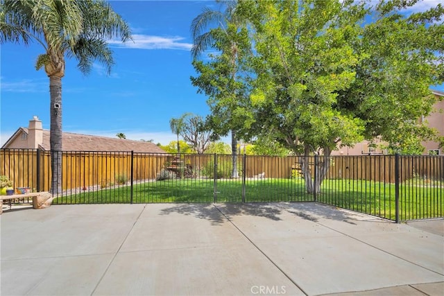 view of patio featuring fence