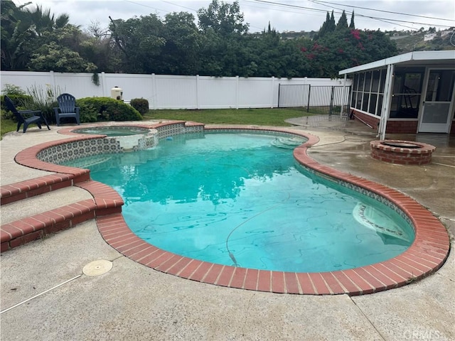 2842 Pietro Dr, Hacienda Heights, CA 91745 - view of swimming pool with a sunroom, a fenced backyard, a patio area, and a pool with connected hot tub