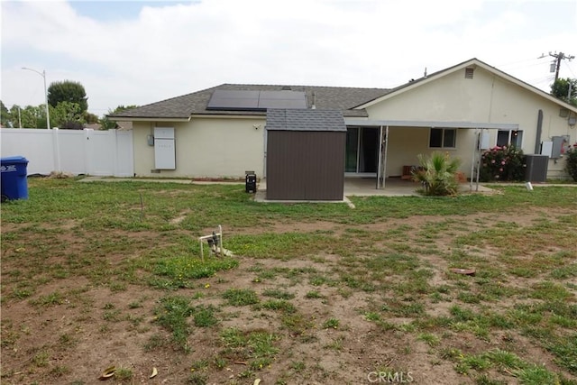 2842 Pietro Dr, Hacienda Heights, CA 91745 - rear view of house with roof mounted solar panels, roof with shingles, and a patio
