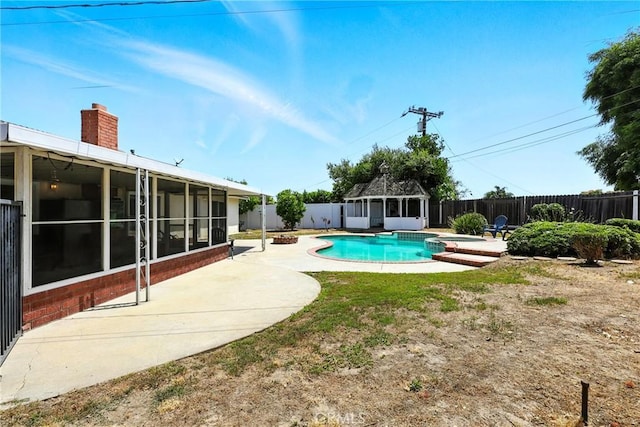 2842 Pietro Dr, Hacienda Heights, CA 91745 - view of pool featuring a gazebo, a fenced backyard, a sunroom, a patio area, and a pool with connected hot tub