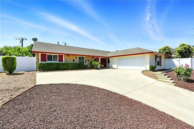 2842 Pietro Dr, Hacienda Heights, CA 91745 - ranch-style house featuring a gate, an attached garage, driveway, and stone siding