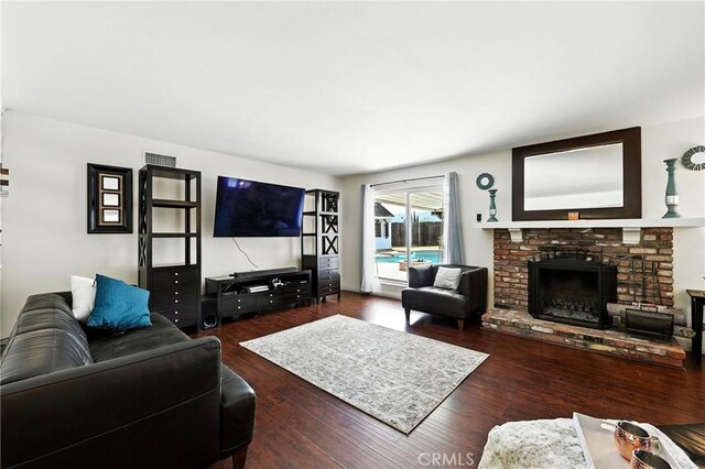 2842 Pietro Dr, Hacienda Heights, CA 91745 - living area with wood finished floors and a brick fireplace