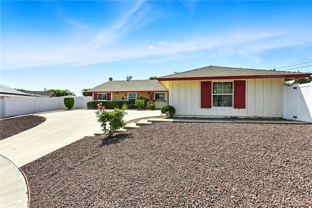 2842 Pietro Dr, Hacienda Heights, CA 91745 - single story home featuring board and batten siding and a fenced backyard