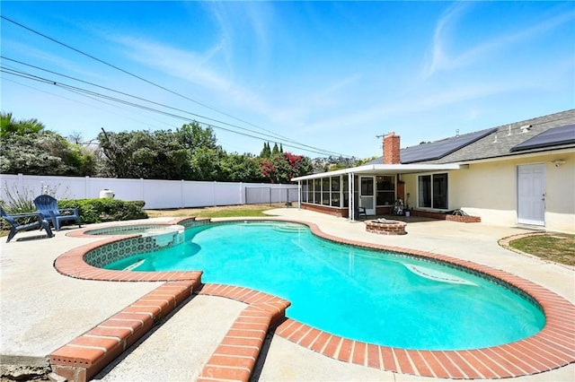 2842 Pietro Dr, Hacienda Heights, CA 91745 - view of swimming pool with a sunroom, a patio area, an outdoor fire pit, a fenced backyard, and a pool with connected hot tub