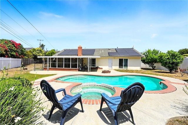 2842 Pietro Dr, Hacienda Heights, CA 91745 - view of swimming pool with a sunroom, a patio, a pool with connected hot tub, and a fenced backyard
