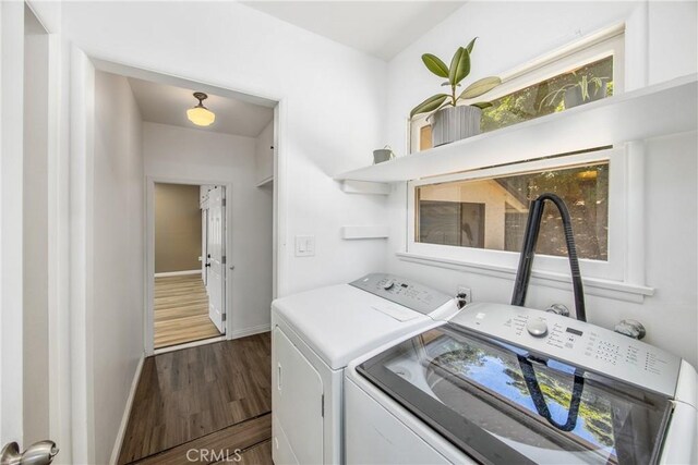 30993 Palo Alto Dr, Redlands, CA 92373 - laundry room with washing machine and clothes dryer, baseboards, and dark wood-type flooring