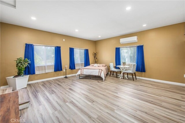 30993 Palo Alto Dr, Redlands, CA 92373 - bedroom with a wall unit AC, baseboards, wood finished floors, multiple windows, and recessed lighting