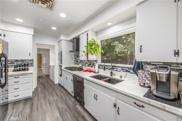 30993 Palo Alto Dr, Redlands, CA 92373 - kitchen with a sink, stainless steel appliances, decorative backsplash, wall chimney range hood, and recessed lighting