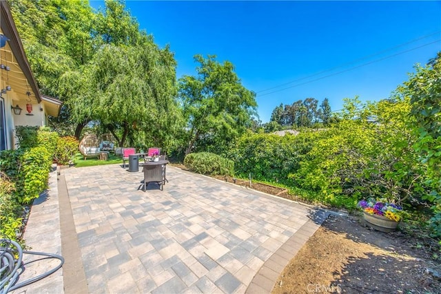 30993 Palo Alto Dr, Redlands, CA 92373 - view of patio / terrace featuring view of wooded area