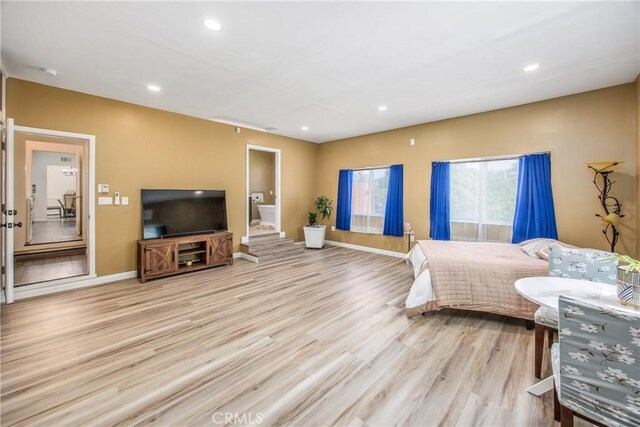 30993 Palo Alto Dr, Redlands, CA 92373 - bedroom featuring light wood-type flooring, baseboards, recessed lighting, and connected bathroom