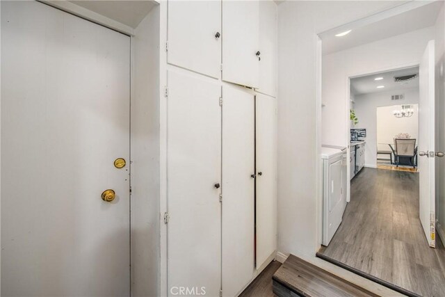30993 Palo Alto Dr, Redlands, CA 92373 - hallway with washer and clothes dryer, wood finished floors, and recessed lighting