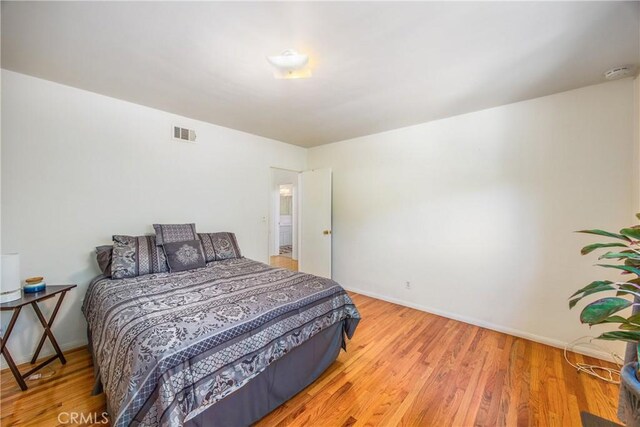 30993 Palo Alto Dr, Redlands, CA 92373 - bedroom with light wood-type flooring and baseboards