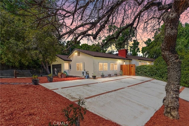 30993 Palo Alto Dr, Redlands, CA 92373 - view of front of home with stucco siding and a chimney