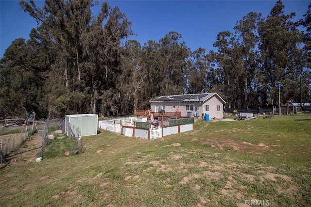 968 Calle Fresa, Nipomo, CA 93444 - view of yard featuring a garden and an outdoor structure