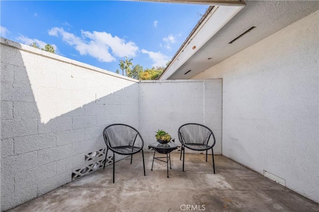 view of patio with fence
