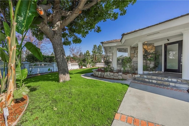 view of yard featuring fence
