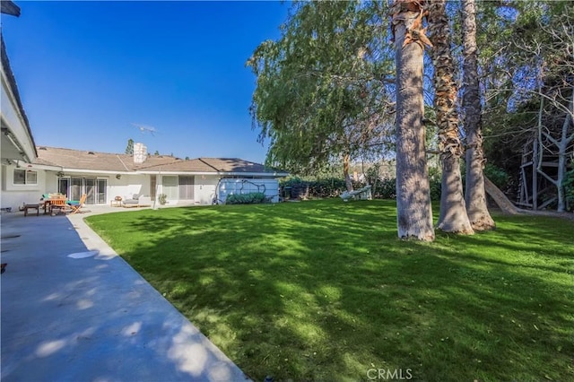 view of yard with a patio