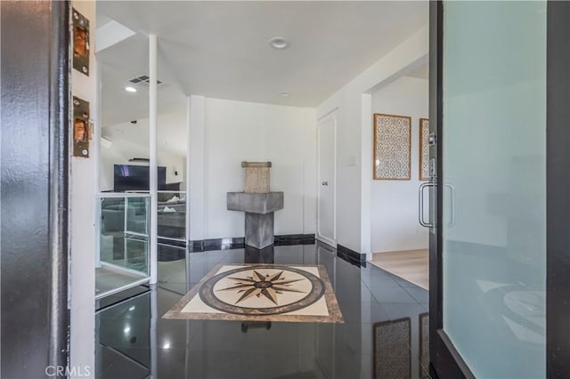 bathroom featuring visible vents, recessed lighting, and tile patterned flooring