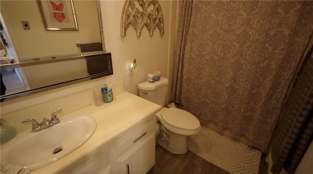 2189 Via Mariposa # C, Laguna Woods, CA 92637 - bathroom with toilet, vanity, wood finished floors, and a shower with curtain