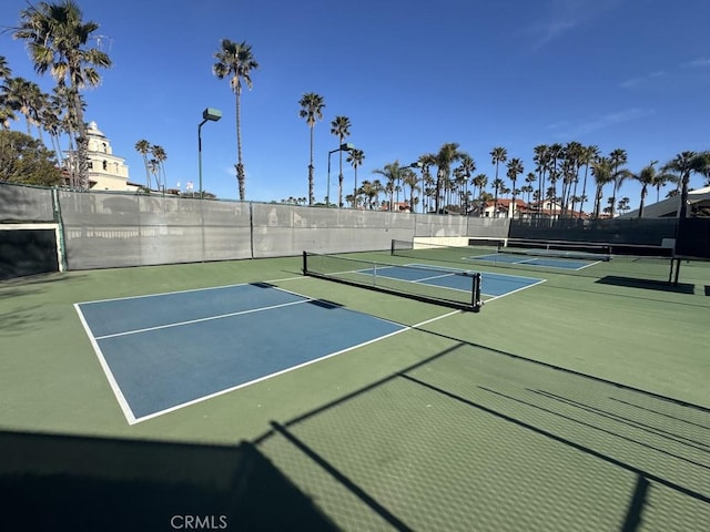 2244 Cannes Sq, Oxnard, CA 93035 - view of tennis court featuring community basketball court and fence
