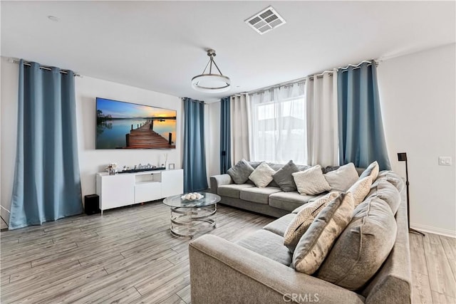 8794 Applewood St, Chino, CA 91708 - living room with visible vents and light wood-type flooring