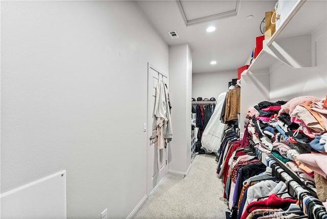 8794 Applewood St, Chino, CA 91708 - walk in closet with visible vents, attic access, and carpet floors