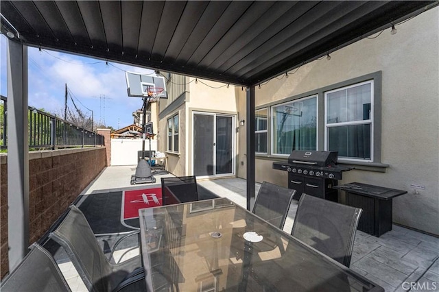8794 Applewood St, Chino, CA 91708 - view of patio featuring grilling area, fence, and outdoor dining area
