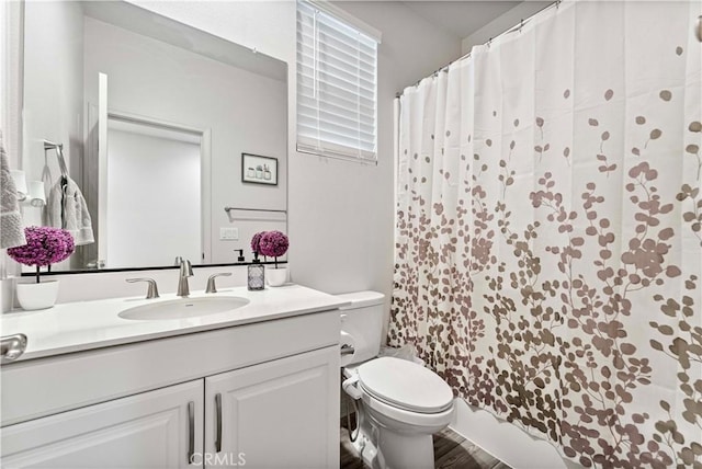 8794 Applewood St, Chino, CA 91708 - bathroom featuring curtained shower, vanity, and toilet