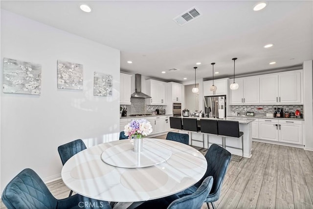 8794 Applewood St, Chino, CA 91708 - dining room featuring visible vents, light wood-style flooring, recessed lighting, and baseboards
