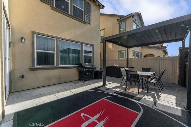 8794 Applewood St, Chino, CA 91708 - view of patio featuring grilling area, outdoor dining space, and fence