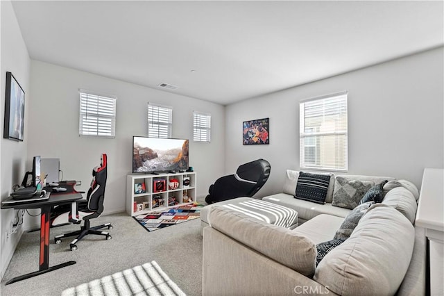 8794 Applewood St, Chino, CA 91708 - living area with a wealth of natural light, visible vents, and carpet floors