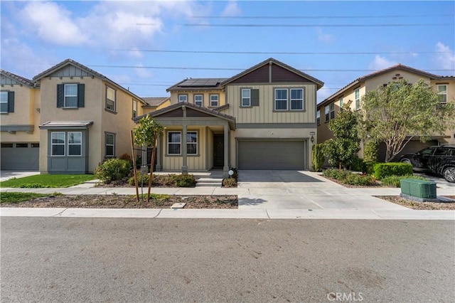 8794 Applewood St, Chino, CA 91708 - craftsman house with board and batten siding, an attached garage, solar panels, and driveway