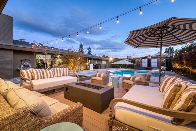 5385 N Van Ness Blvd, Fresno, CA 93711 - view of patio featuring an outdoor living space with a fire pit and a deck