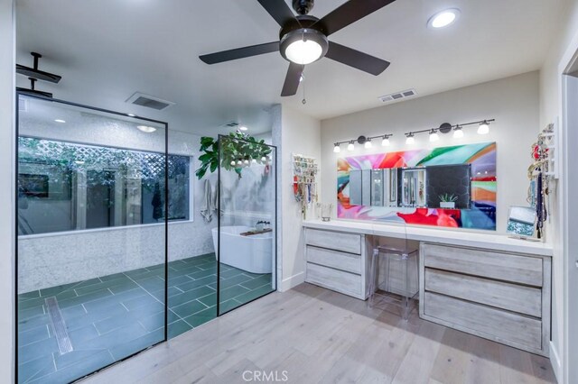5385 N Van Ness Blvd, Fresno, CA 93711 - full bathroom featuring a soaking tub, vanity, a ceiling fan, wood finished floors, and recessed lighting