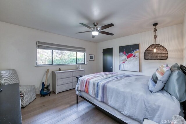 5385 N Van Ness Blvd, Fresno, CA 93711 - bedroom with wood finished floors and ceiling fan