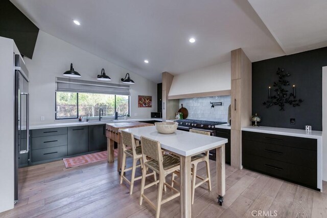 5385 N Van Ness Blvd, Fresno, CA 93711 - dining space featuring vaulted ceiling, light wood-style floors, and recessed lighting