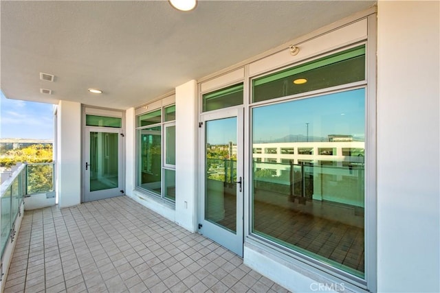 balcony featuring visible vents