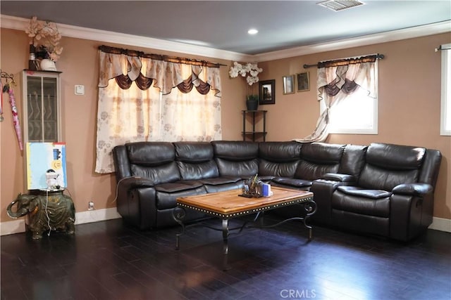 living room with visible vents, baseboards, ornamental molding, recessed lighting, and wood finished floors