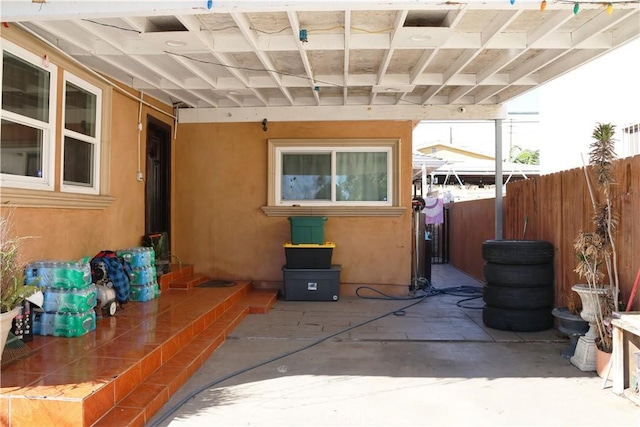 view of patio / terrace with fence