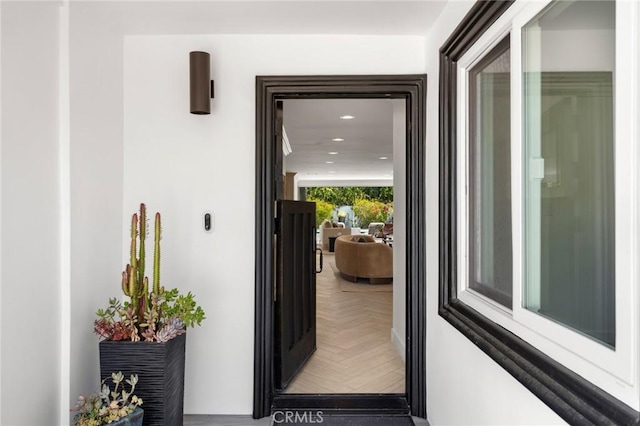 doorway to outside featuring recessed lighting