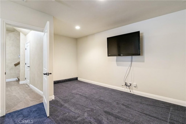 basement featuring recessed lighting, baseboards, and carpet floors
