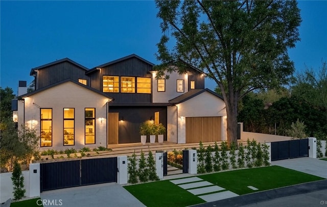 view of front of house featuring a fenced front yard and a gate