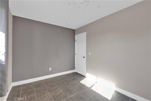 17908 Birch St, Hesperia, CA 92345 - tiled spare room with baseboards