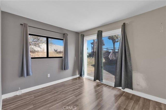 17908 Birch St, Hesperia, CA 92345 - unfurnished room with baseboards and wood finished floors