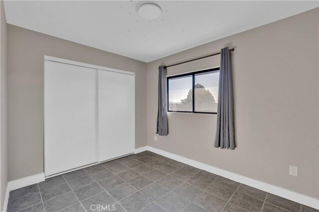 17908 Birch St, Hesperia, CA 92345 - unfurnished bedroom featuring a closet and baseboards