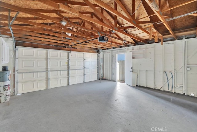 17908 Birch St, Hesperia, CA 92345 - garage featuring a garage door opener and gas water heater